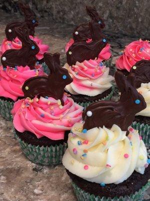 Easter cupcakes with butter creme frosting decorated with a chocolate bunny