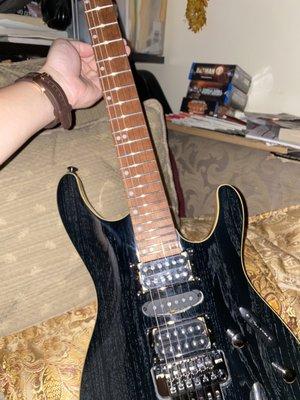 My electric guitar that was for restringing and basic setup.