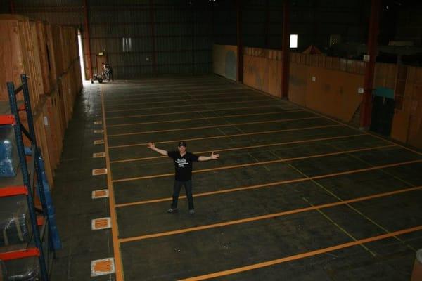 Watford Moving & Storage Warehouse during our expansion. Painting the warehouse floor ...