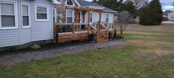 Beautiful deck , paver walkway and revamped existing flower beds