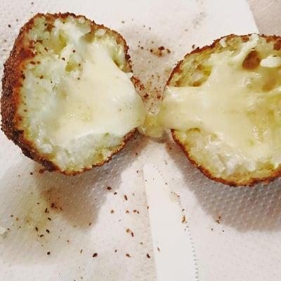 Fried rice balls stuffed with cheese