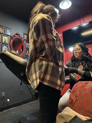 Wife getting tattoo placed by Adrianna