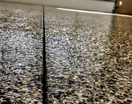 Garage epoxy flooring installation.