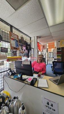 Allison at the front desk