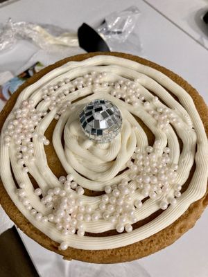 Icing and pearls first then I added the flowers. 11/20/23