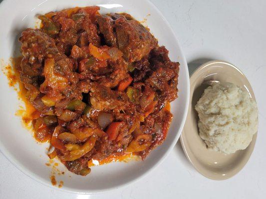 Goat plate with a side of fufu