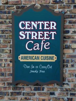 Welcome Sign at the corner of W Center St & 4th Ave NW.