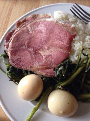 Headcheese and smoked eggs with some rice and collard greens.