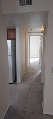 hallway down to master and guest bedrooms