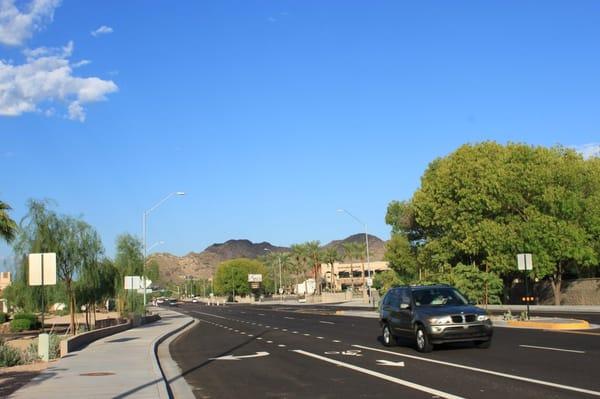 Sunny Scottsdale Vacation Rental Condo is surrounded by beautiful mountains, golf, with an entrance/exit via curving roads.