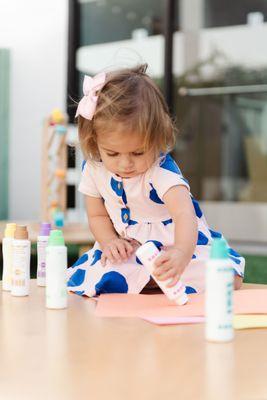 Outdoor time is a great opportunity for children to express themselves through art in the fresh air.