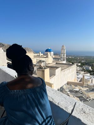 Santorini Greece   see the Blue Top. That's a church.