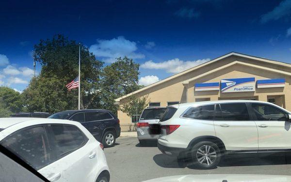 Four cars backing again, the parking situation is out of control here at this location.  USPS has a huge parking lot for employees on side.