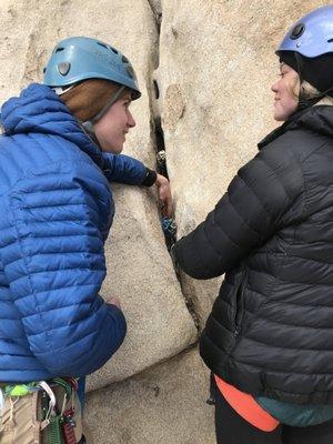 High school students learn the art of traditional gear placement.