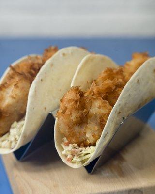 Free Thinker.  Fried coconut shrimp with a slaw mixture of brown sugar and cinnamon on a flour tortilla.