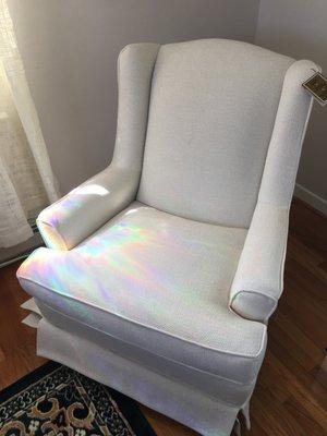 Privacy filters on windows shine prisms of light throughout the office.