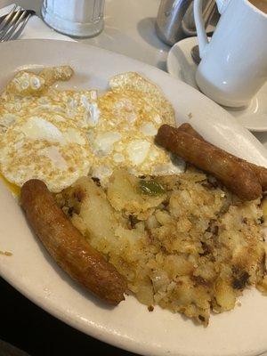 Two eggs over medium home fries and sausage. My fave