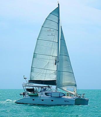 S/V Tortuga, a Manta catamaran shown sailing the Straits of Florida