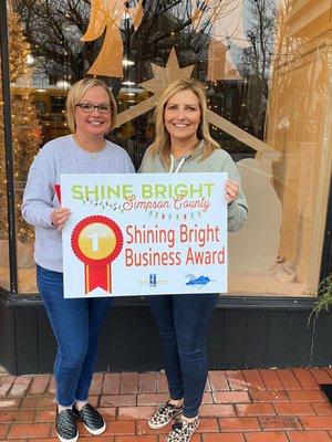 Excited to win first place in the Shining Bright Business category for our 2021 Christmas window display!