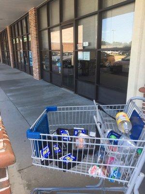 This was the cart filled with trash , blocking the way to their front door that I mentioned in my review.