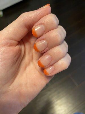 Orange French dip mani. Poor application.