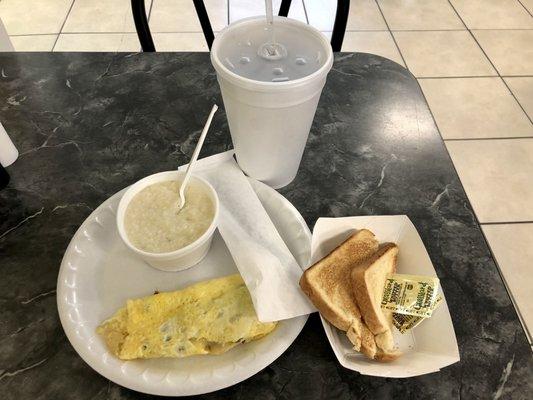 Omelet with sausage and provolone, served with grits and toast...from the pier grill.