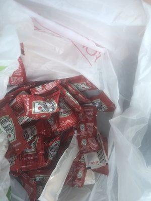 Inside this bag contains 41 packs of ketchup, 6 packs of Arby's sauce and 8 packs of spicy three peppers sauces