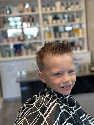 Cute boys hair cut .