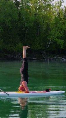 Trainer & yoga teacher Stacy Jago having fun on her paddle board