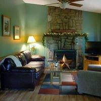 Cuddle up in front of our wood burning fireplace and watch a movie on Directv