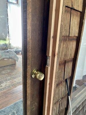 Modified door casing to fit new screen door