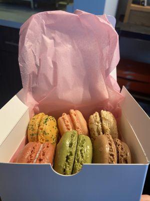 Box of 6 Left to right row 1: mango, Rose, tiramisu Left to right row 2: red velvet, pistachio, Belgium chocolate