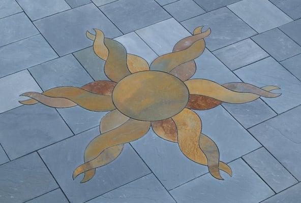 bluestone patio with sun design