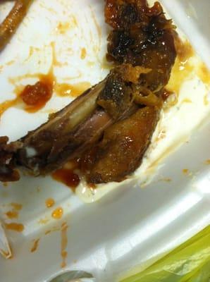 Last piece of chicken...couldnt enjoy it, had to spit it out. Disguisting! Can you see the black area.....all rotten. Never again Jenny's!