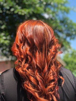 Copper hair color with alot of shine and dimension