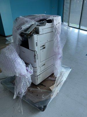 Damaged copier done by R & L Carriers