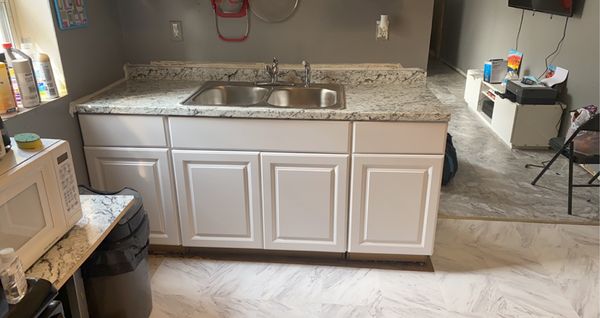 Kitchen Sink, countertops and cabinets installation