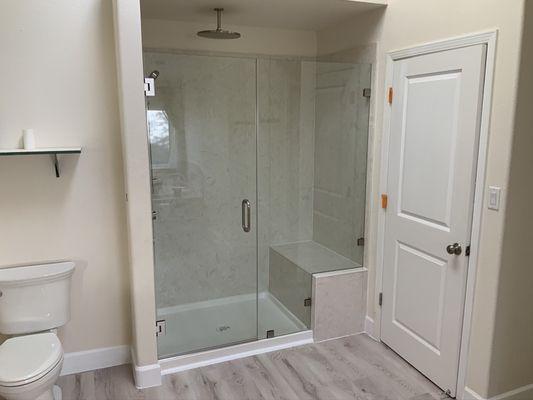 Installed this new custom shower for a customer. new shower door and bench seat. also installed new flooring call for your free estimate