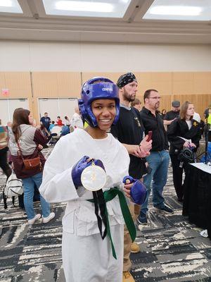 Ms. AMIRICOLE POPE,  PREPARING FOR KUMITE! AT THE PKRA OPEN KARATE TOURNAMENT!