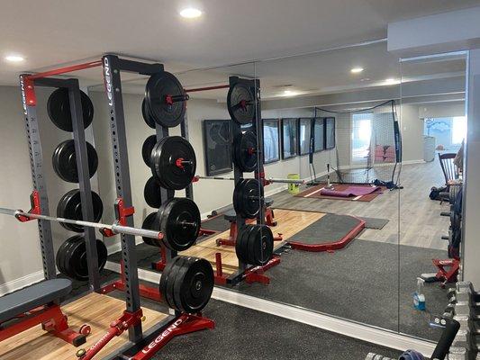 Mirror wall installed for a workout room part 1.