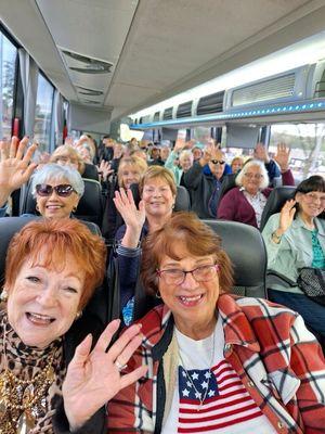 Happy Seniors in comfortable bus