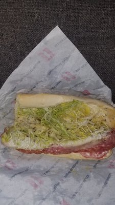 Mushy lettuce and bread soaked with oil and vinegar.