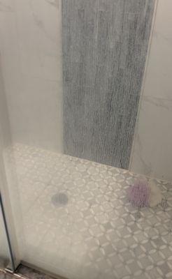 Shower water stains before clean