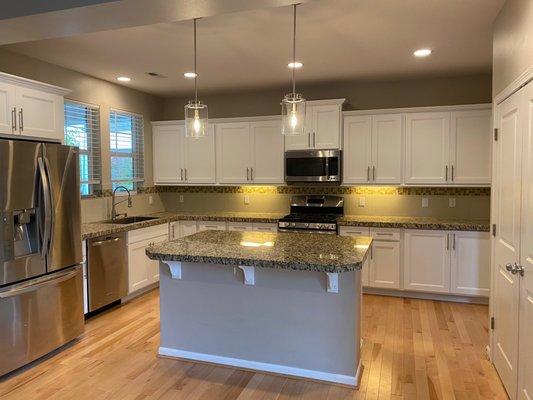 Kitchen cabinets painted by Freddie