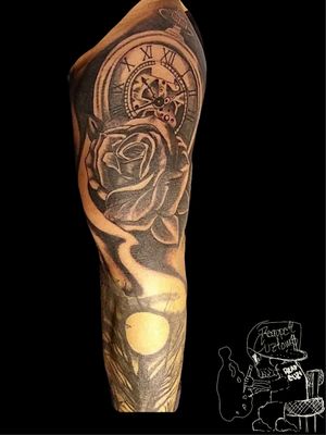 Hope y'all like this great amazing piece of art, did a wonderful black and gray rose, along with a moon, on a hollow tree.