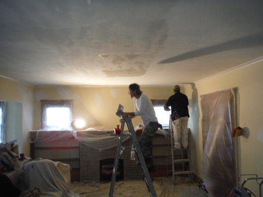 skim coating ceiling in progress