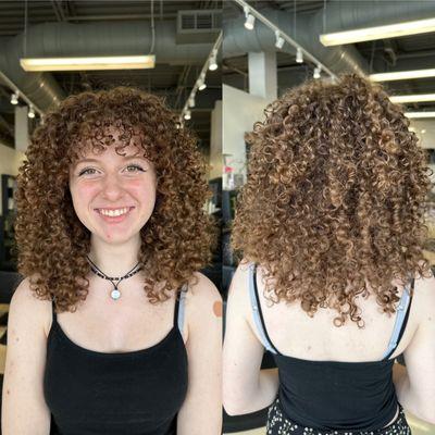 Customized, dry curly cut with a focus on volume and layers and styled with volume in mind.