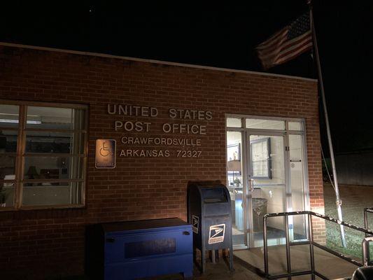 evening view of front entrance to post office