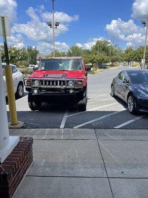 Illegally parked. Blocking the handicapped space