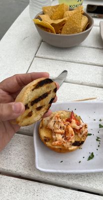 Burnt dry bun, some chewy, dry lobster pieces